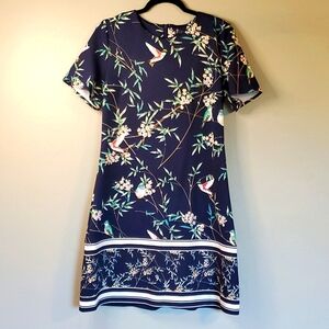 7th Avenue, New York & Company.  Beautiful blue dress with hummingbirds.  Sz med